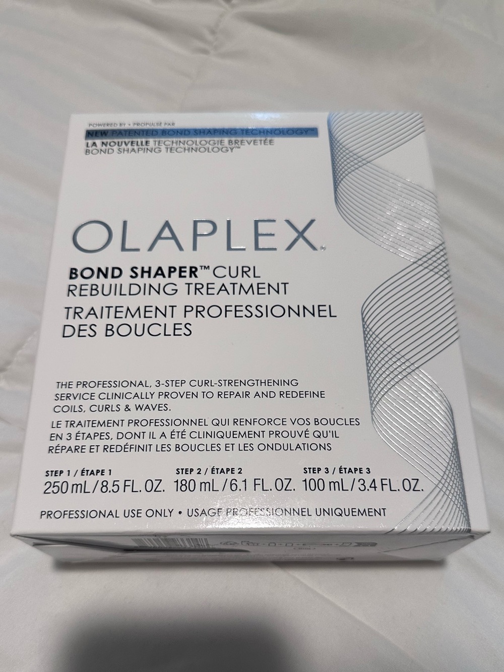OLAPLEX Bond Shaper Curl Rebuilding Treatment – White and Blue Accents